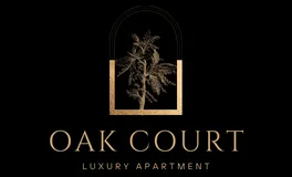 Gold palm tree silhouette in a minimalist arch over the words 'Oak Court Luxury Apartment' on a black background, conveying elegance.