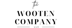 Black logo for The Wooten Company, LLC, featuring a handwritten-style 