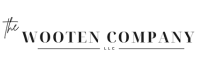 Minimalist logo for The Wooten Company LLC in black text on a transparent background. The word 'the' is written in a small, elegant script to the left of 'WOOTEN COMPANY,' which is displayed in bold, uppercase serif font