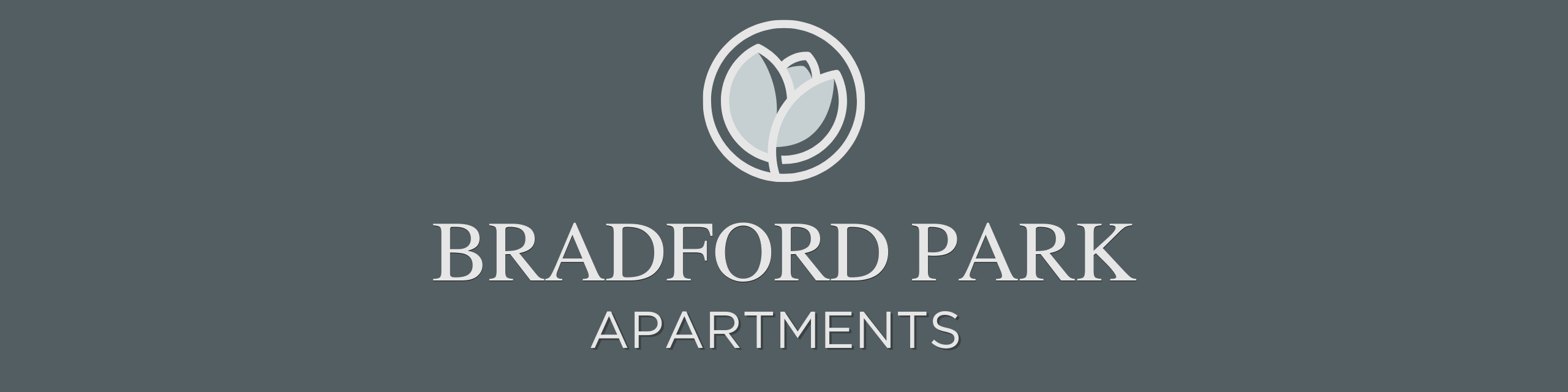 Elegant Bradford Park Apartments logo featuring a sophisticated floral design on a sleek gray background.