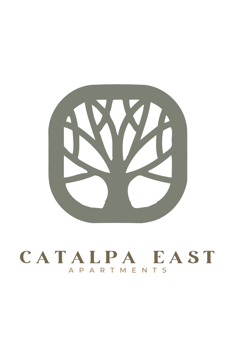 Catalpa East Apartments logo featuring a stylized tree design, symbolizing elegance and modern living.