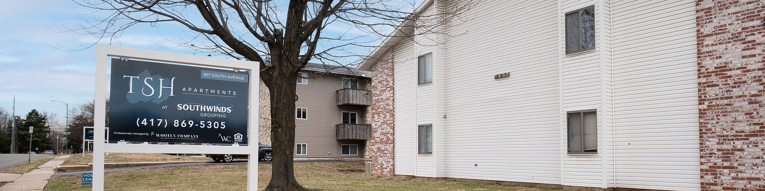 Inviting TSH Apartments at Southwinds, offering modern living spaces in a serene neighborhood with spacious lawns and convenient leasing options.