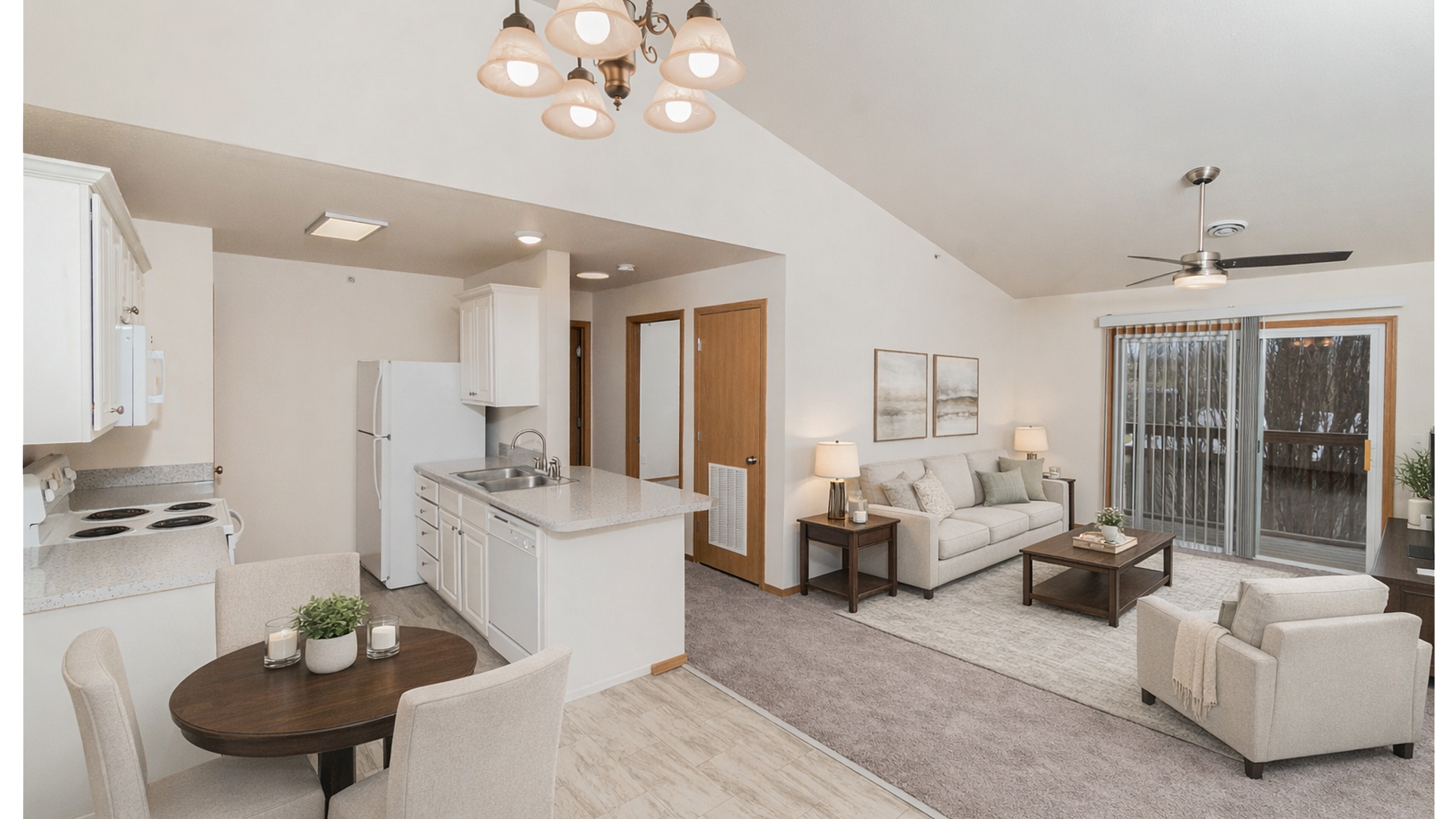 Bright and airy open-plan living area with modern kitchen, cozy seating, and elegant dining space, perfect for relaxation and entertaining.