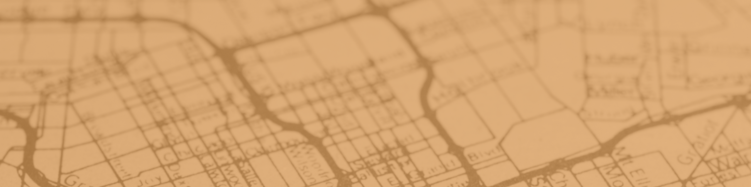Vintage-style map highlighting a charming urban neighborhood layout with streets and rivers in warm sepia tones.