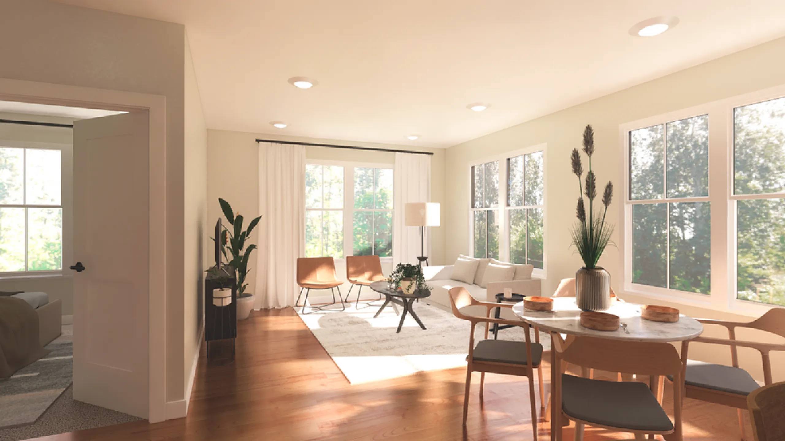 Bright and airy living room with hardwood floors, large windows, and elegant dining area, exuding modern charm and comfort.