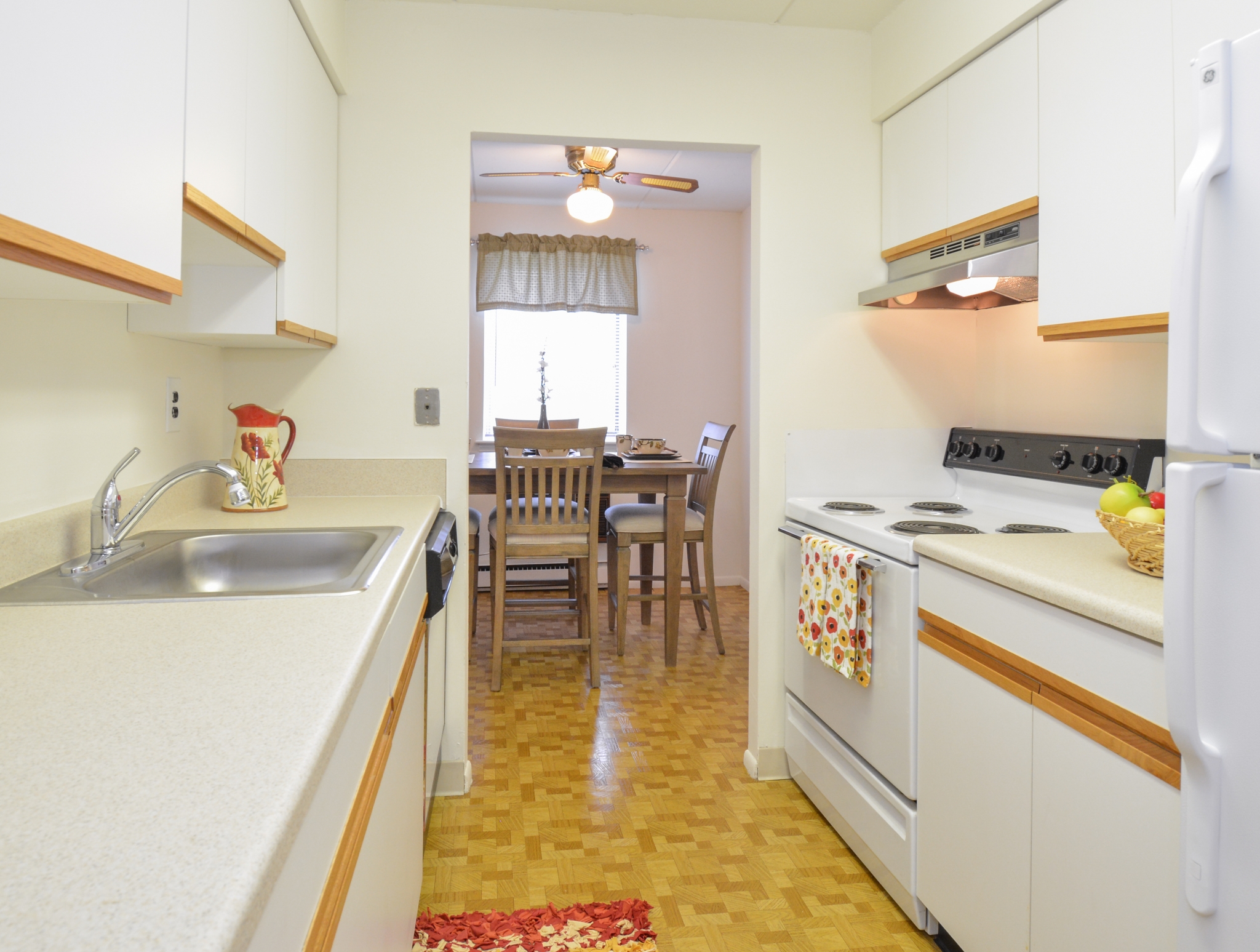 Norwood House Sample Kitchen with White Appliances | Apartments In Downingtown