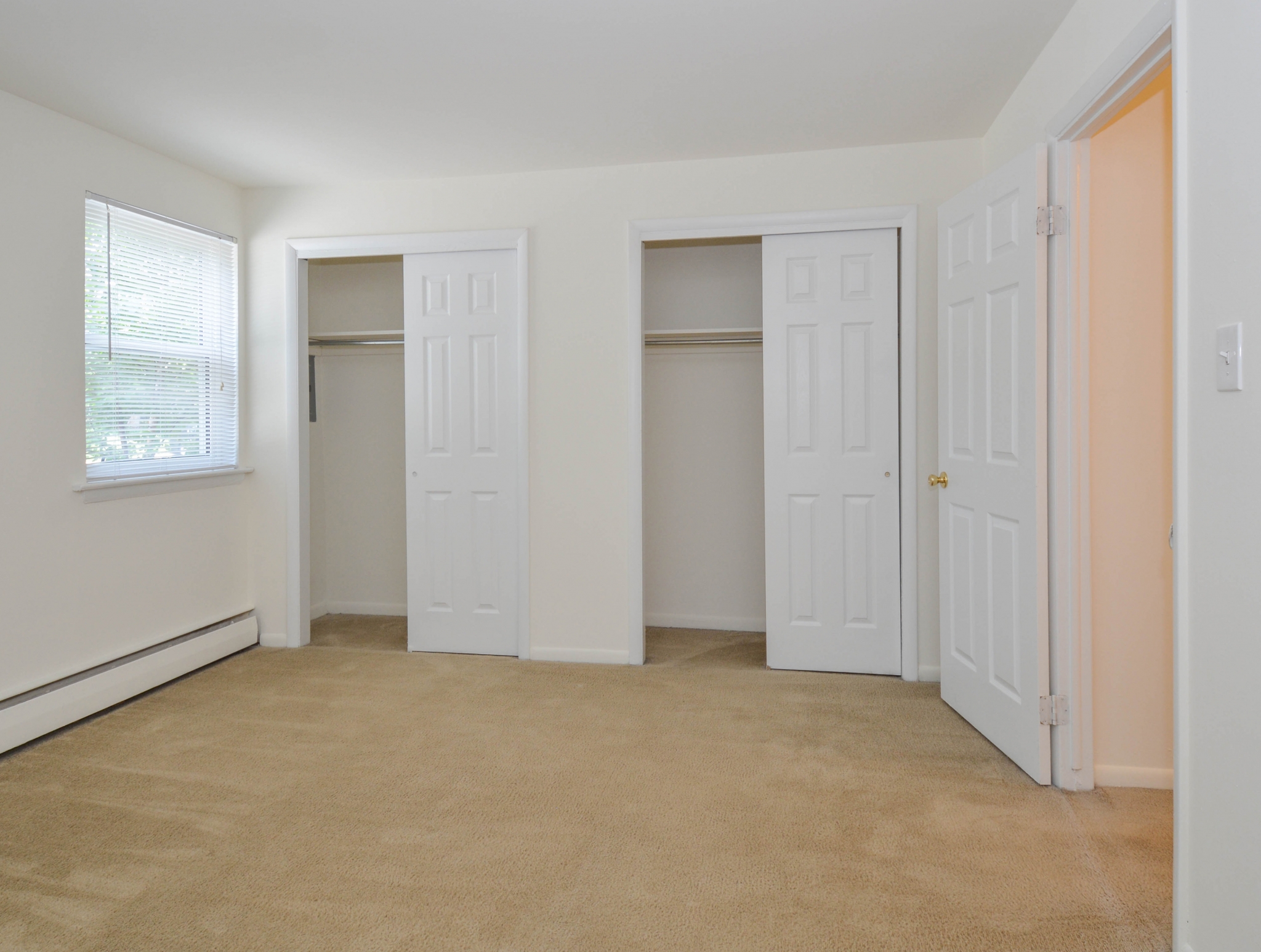Concord Court Sample Bedroom with Closets | Aston Apartments