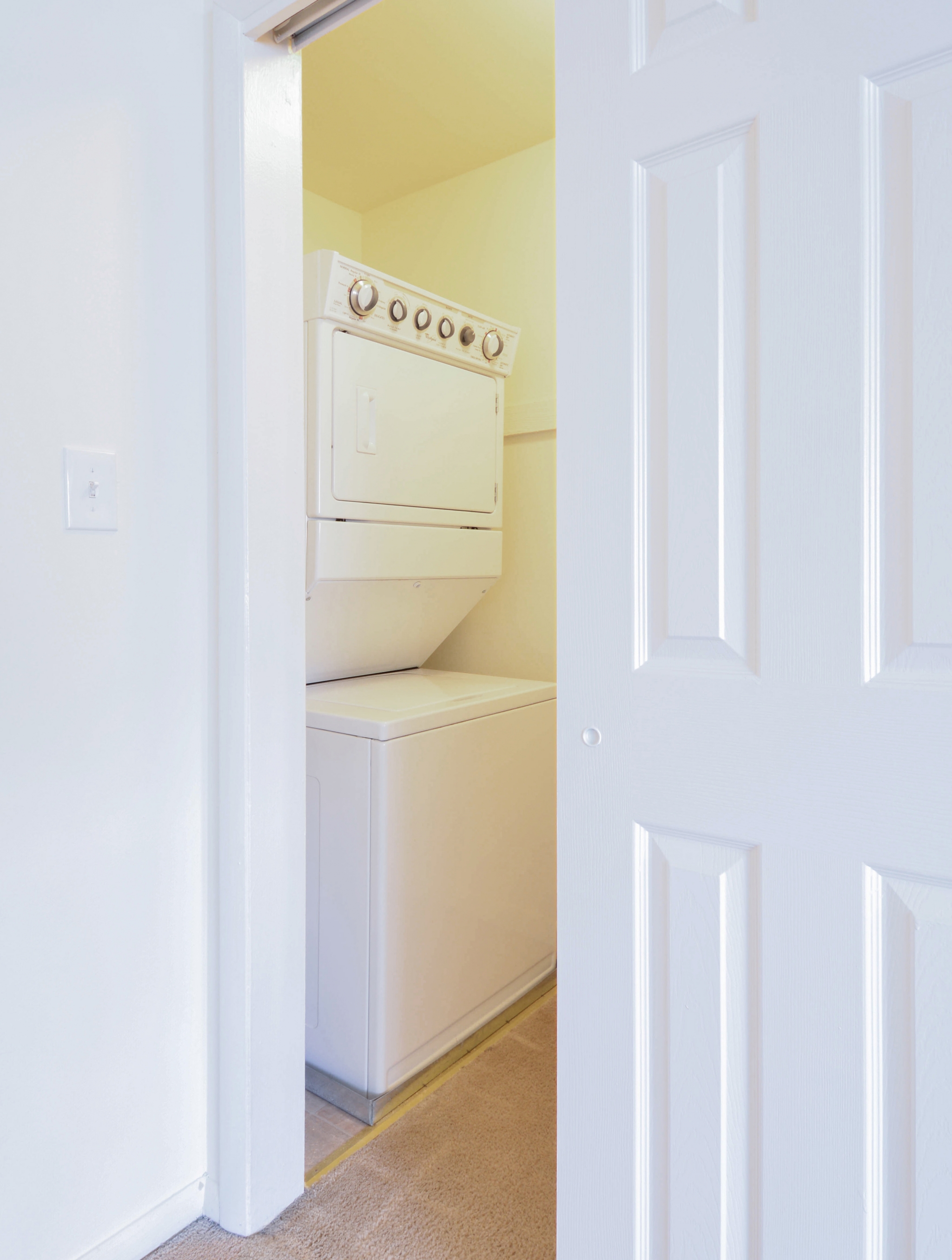 Concord Court Sample Laundry Room with Sliding Door | Aston Apartments