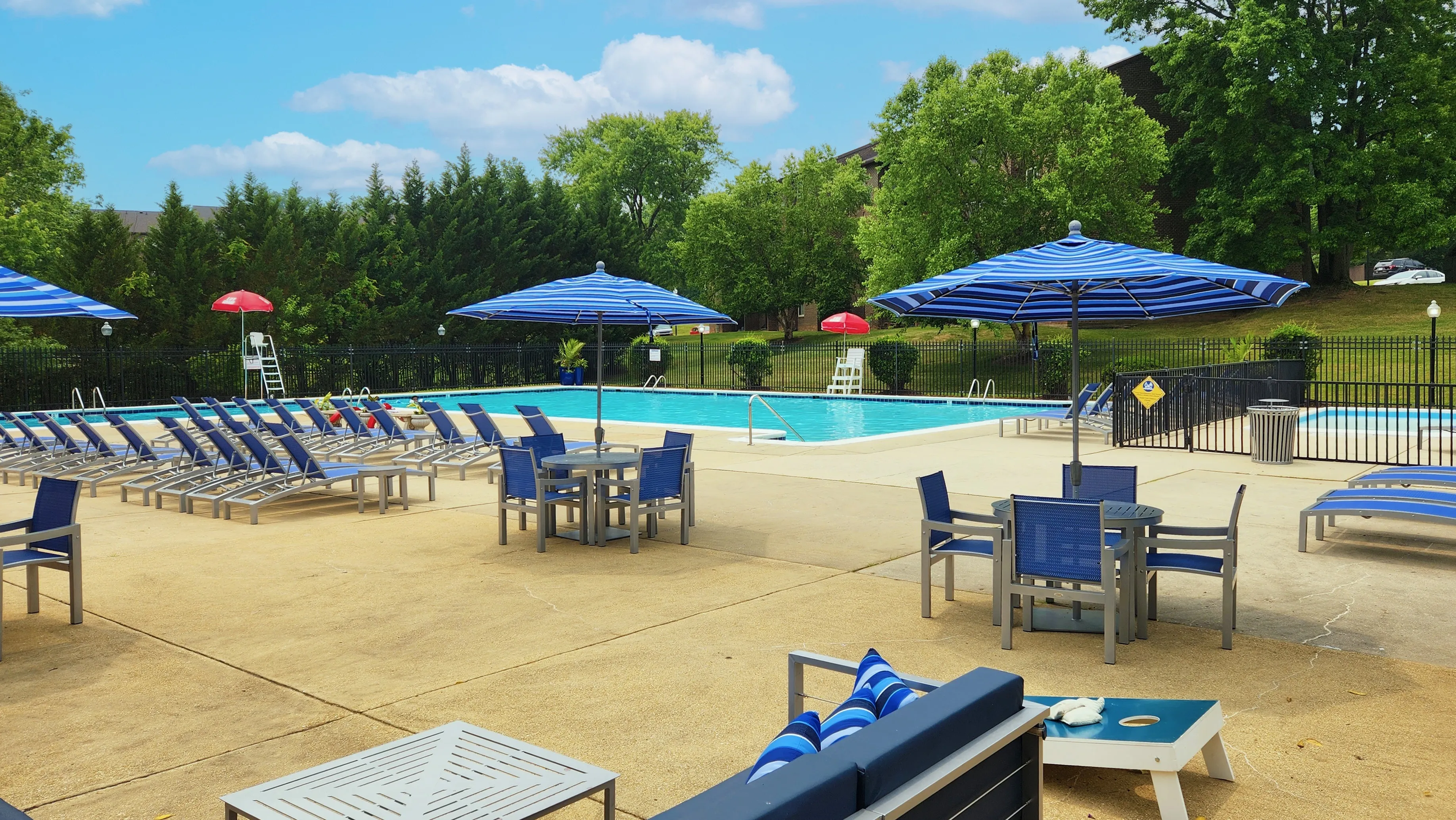 Community swimming pool with outside dining