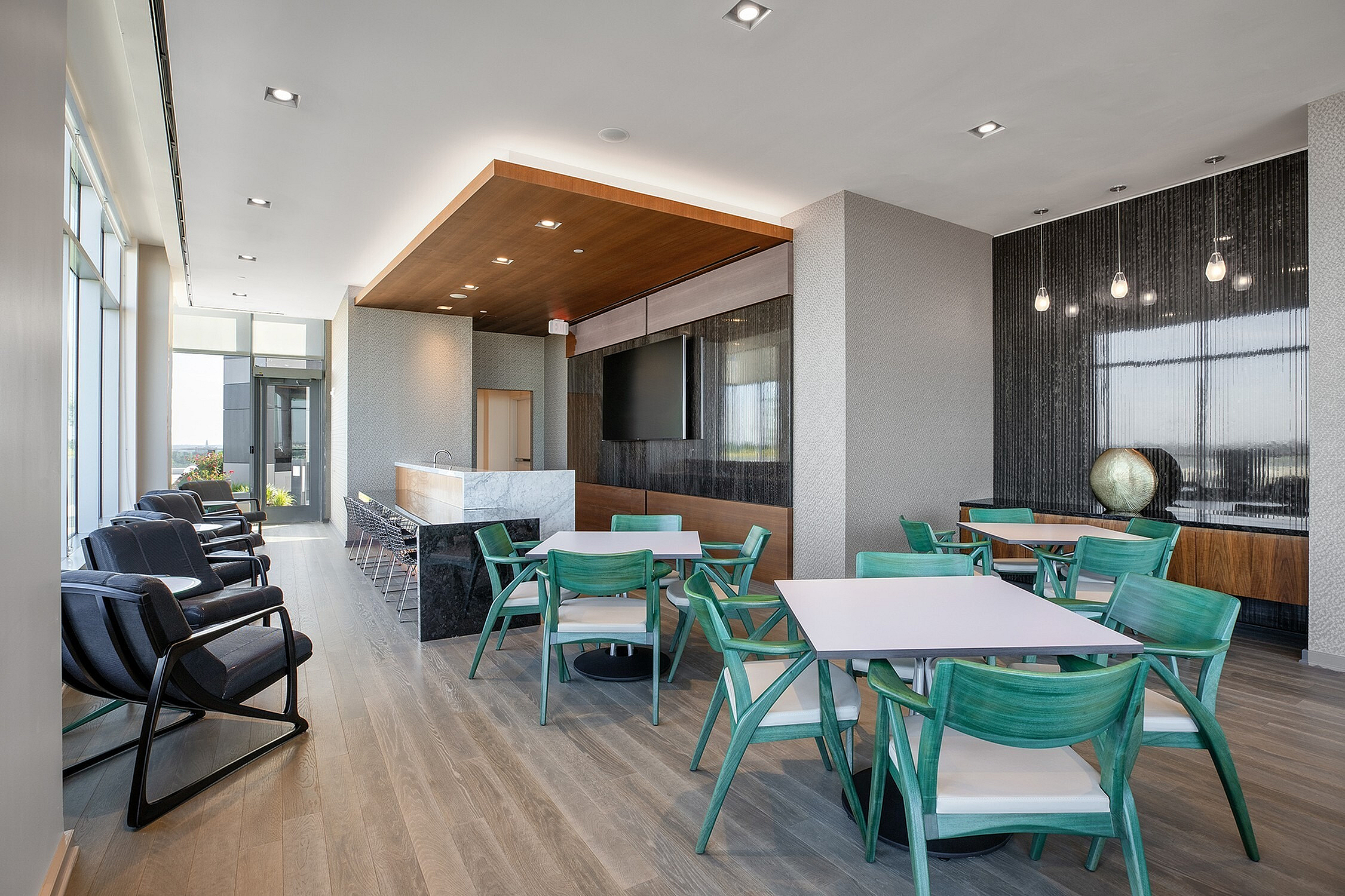 Chairs, kitchen and seating area