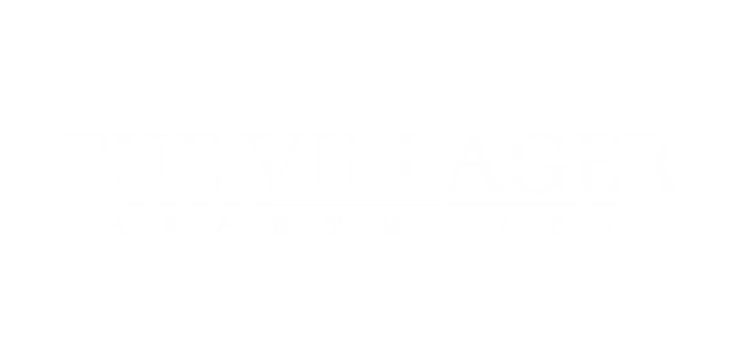 Elegant logo for The Villager Apartments, featuring a modern and clean design.