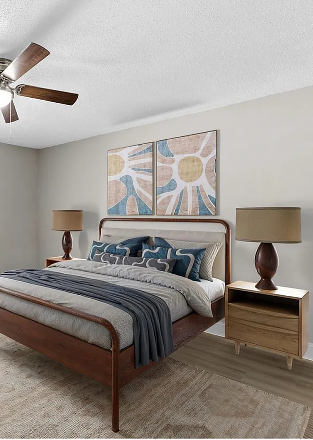 Bright and inviting bedroom with modern decor, featuring elegant wooden furniture, soft lighting, and a cozy ambiance.
