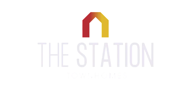 Contemporary logo for The Station Townhomes featuring a stylized house icon with gradient colors.