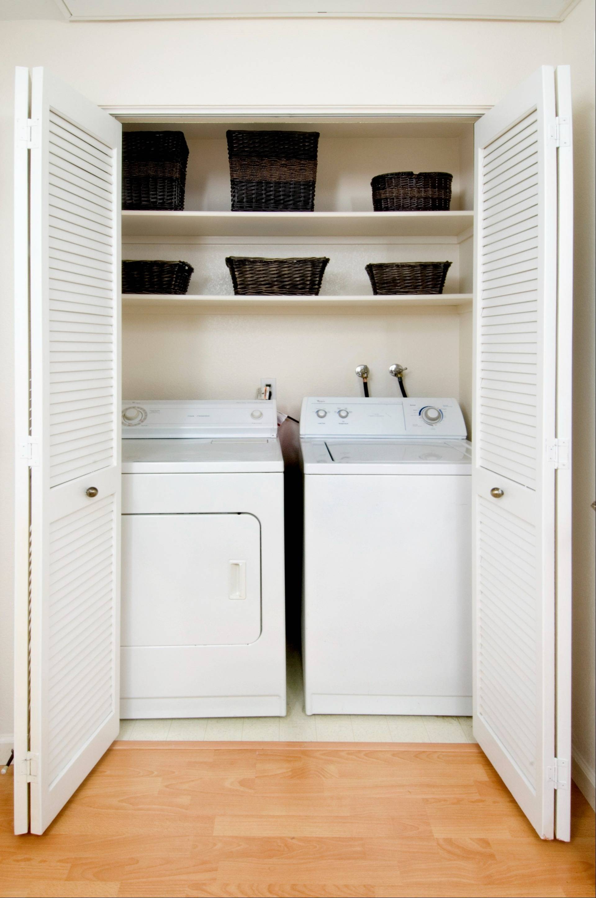 washer and dryer in closet