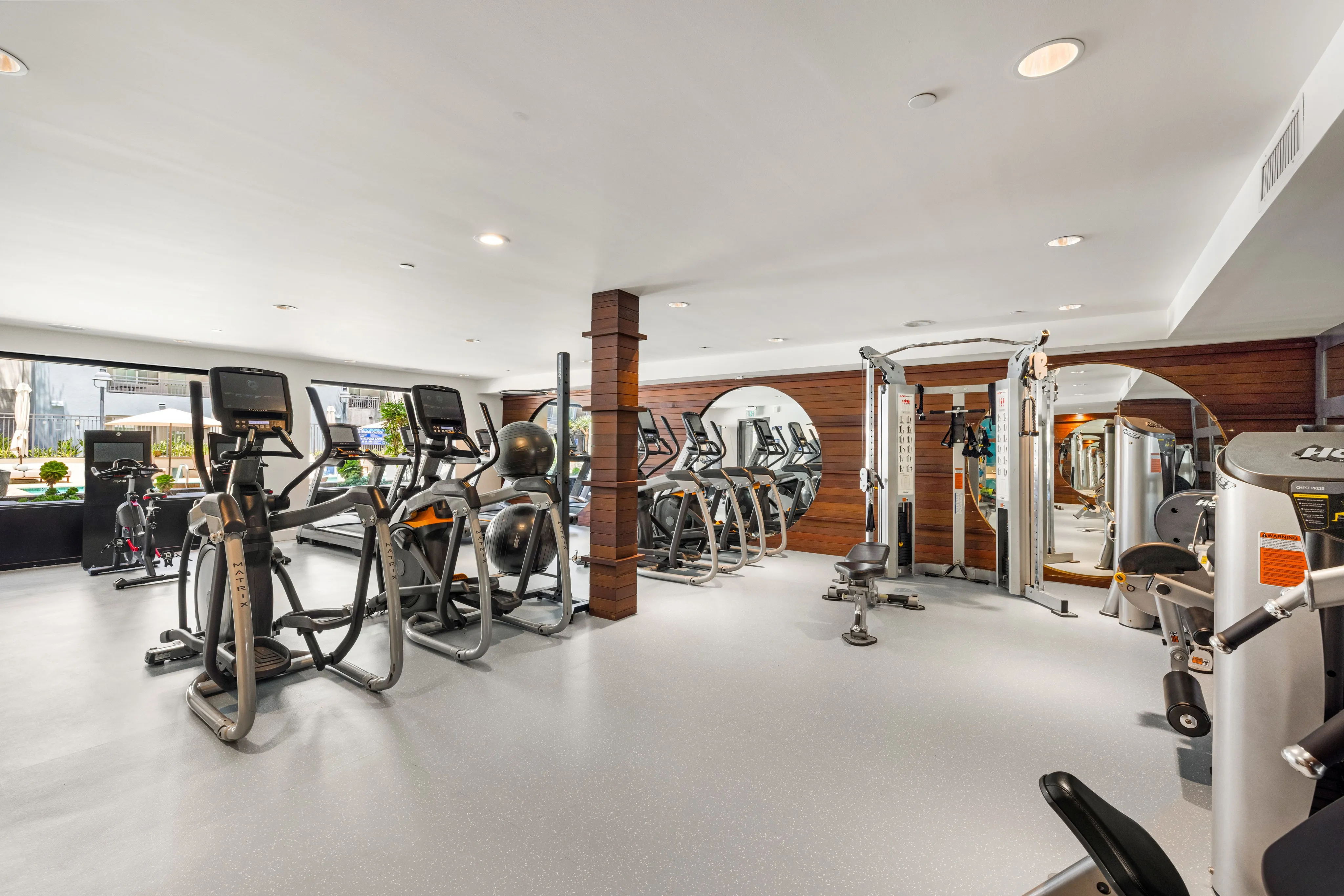 Club-style fitness center with private TV\'s on cardio equipment and complete strength training stations