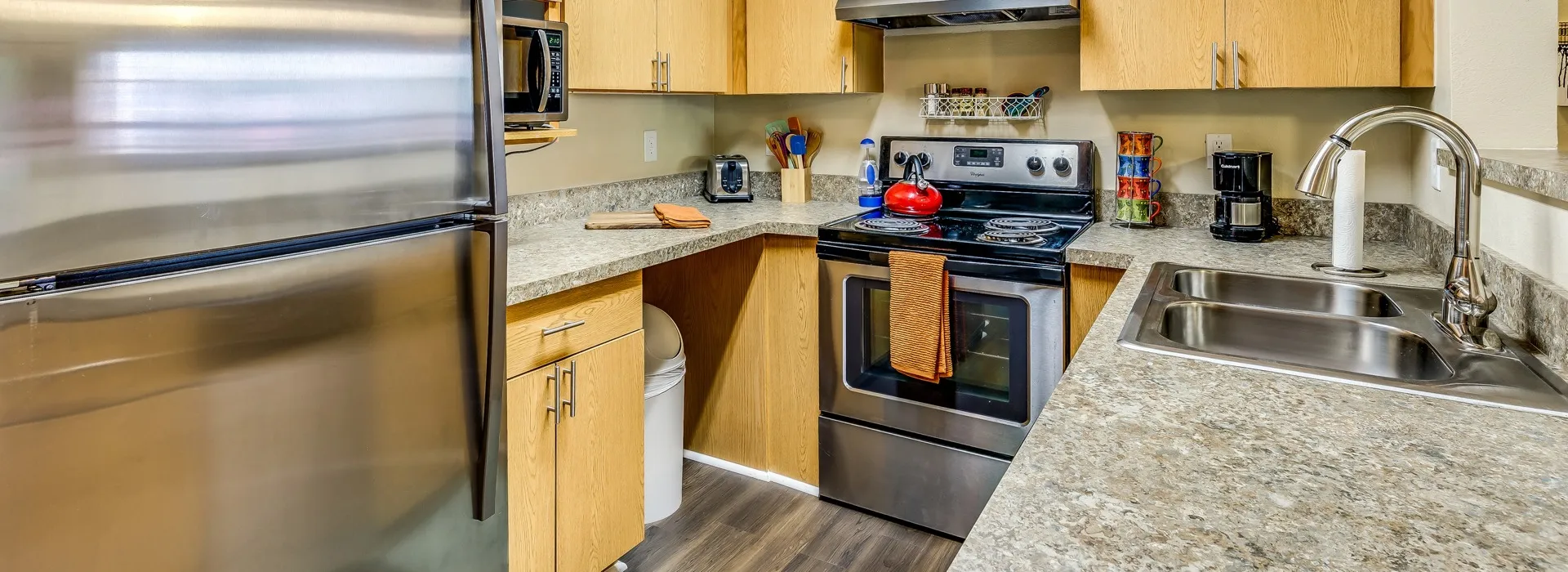 Kitchen  - Campus Lodge Apartments in Columbia, MO