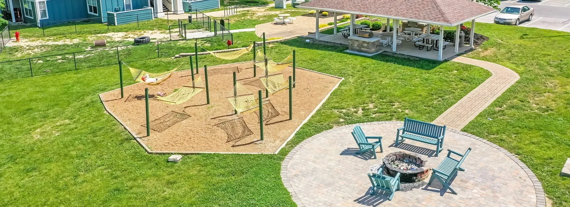 Outdoor Firepit - Campus Lodge Apartments in Columbia, MO