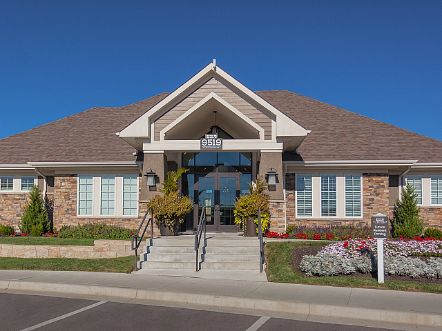 exterior photo showcasing brick building with stairs