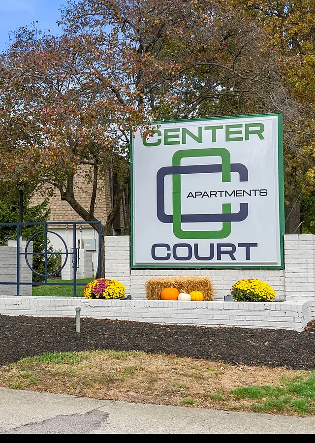 Welcome to Center Court Apartments with charming landscaping and modern design at 4851-4889 Kingshill Dr, offering a tranquil living experience.