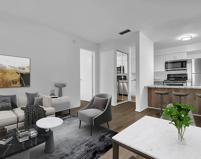Charming brick apartment building with lush green landscaping and inviting entrance.