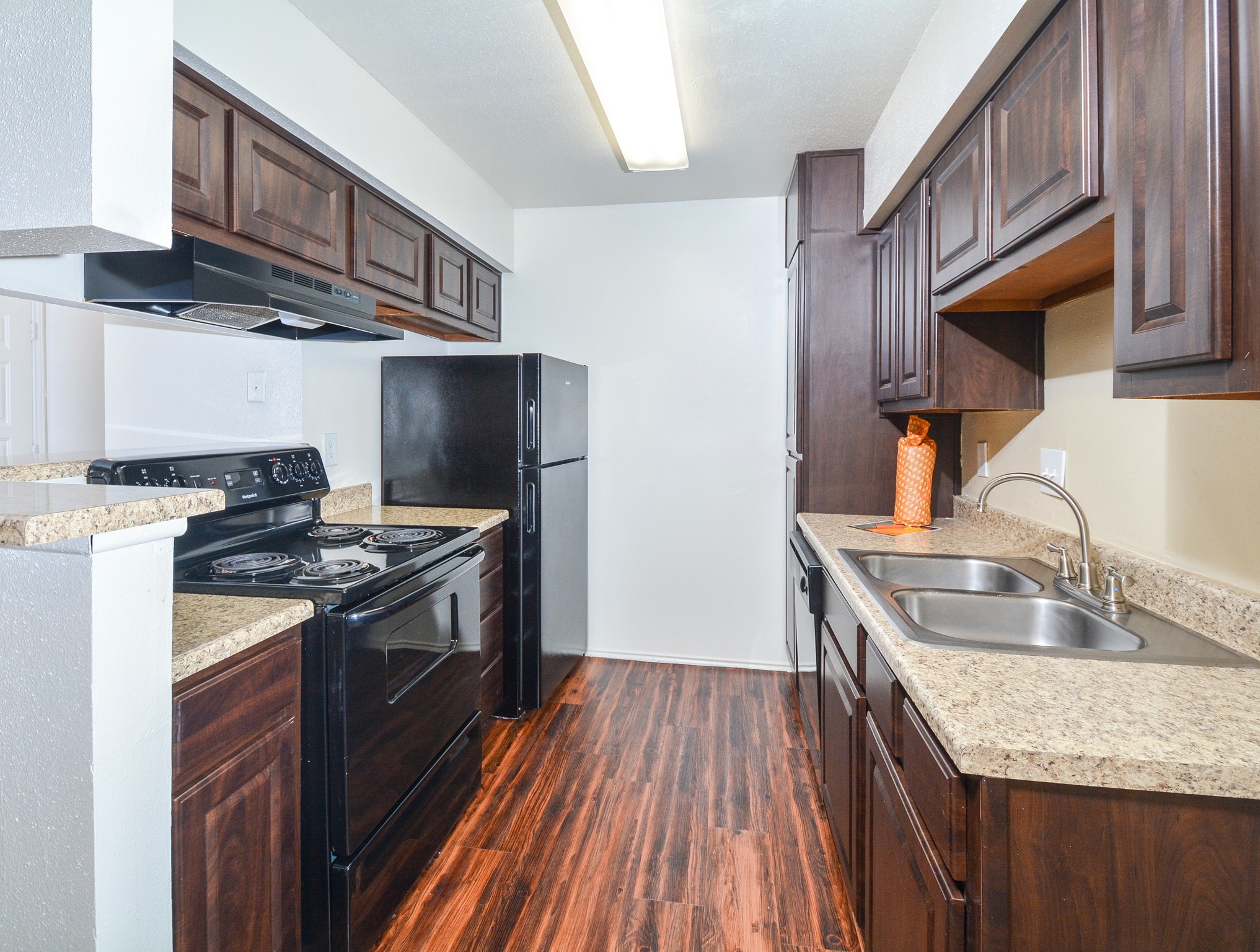 Cherry Cabinets with Black appliances