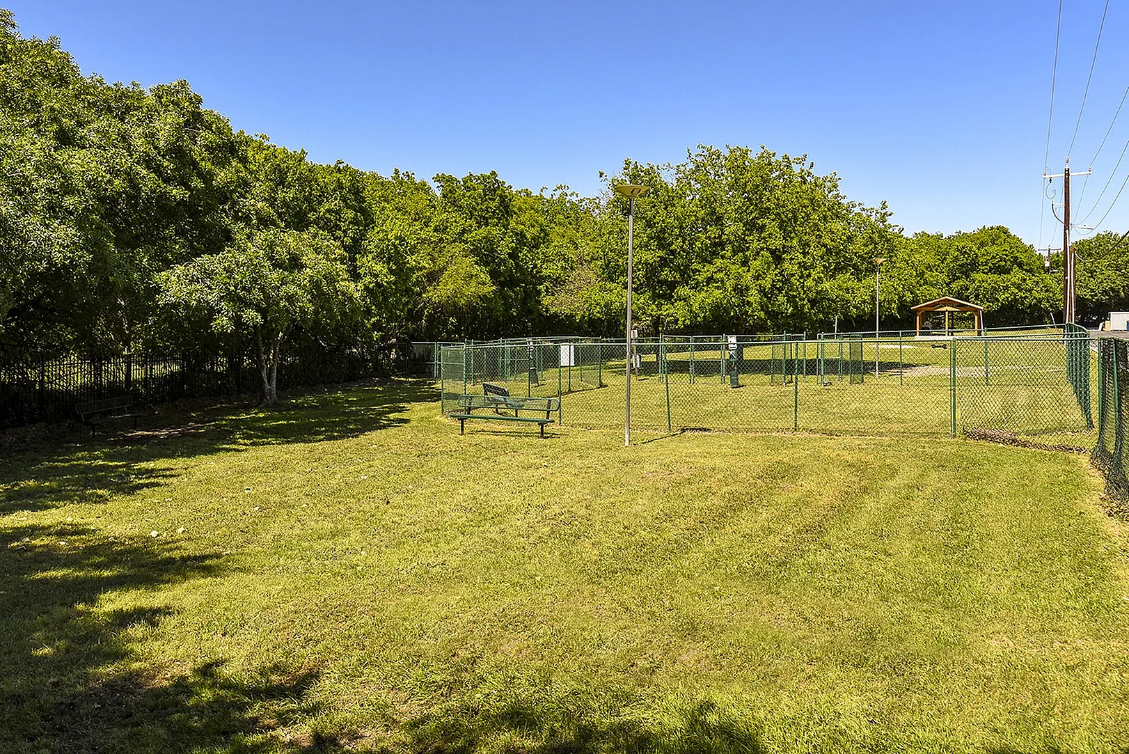 Fenced in area for bark park