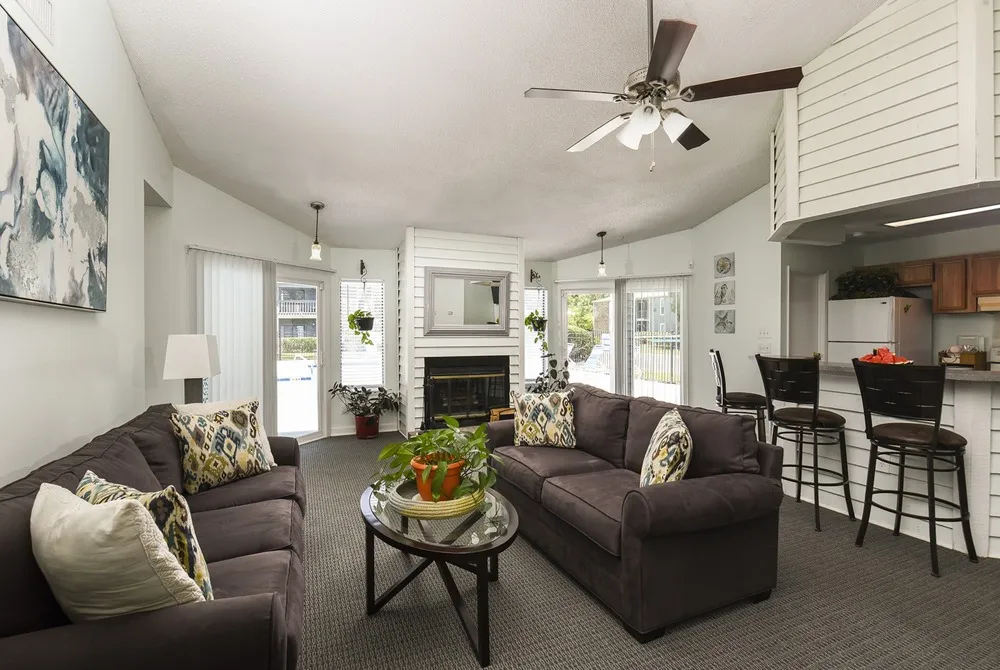 Leasing Office | Couches | Fireplace | 2 doors going to pool area