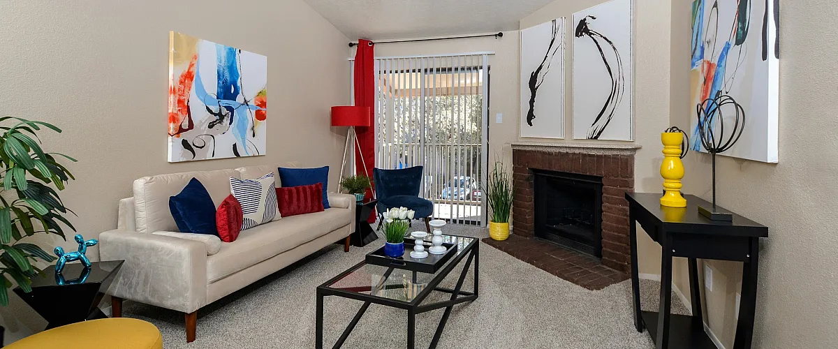 Living area with sliding glass door and fireplace