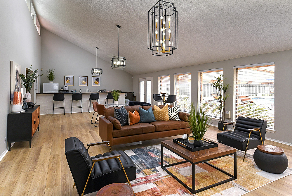 Leasing Office | sofa, 2 chairs, table, and kitchen in the background