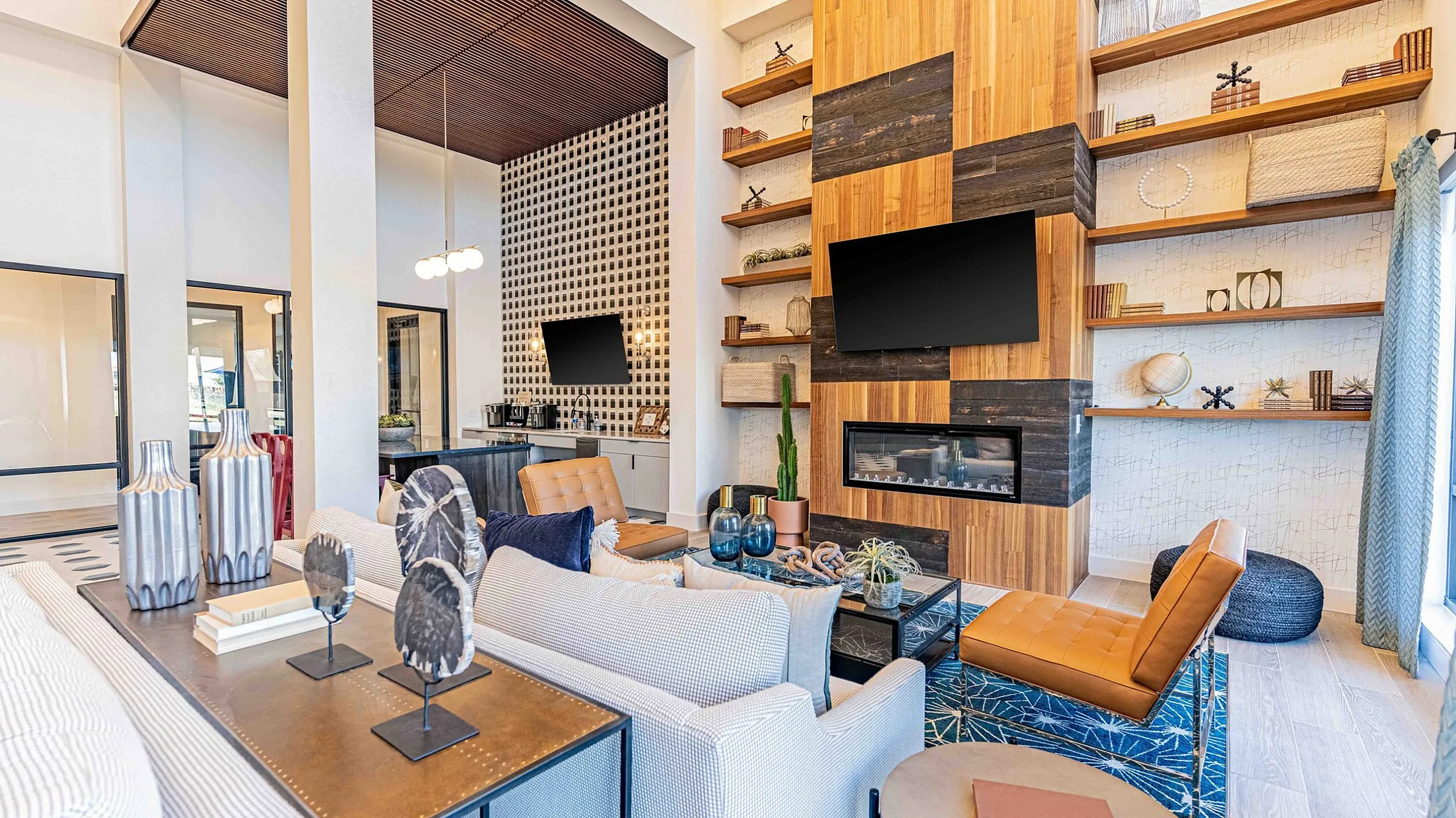 Elegant living room boasting a modern fireplace, stylish shelving, and an eye-catching wall design, ideal for luxury apartment living.