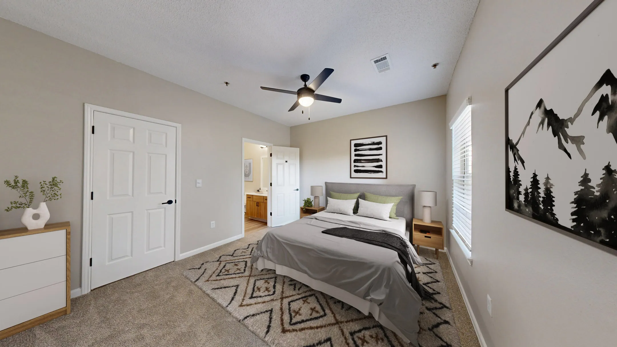 Cozy bedroom with ensuite bathroom.