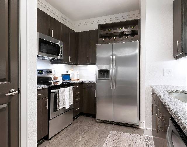 Kitchen with Stainless Steel Appliances and Granite Countertops