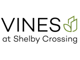 Elegant logo for Vines at Shelby Crossing, featuring modern and sleek typography with a leaf design.