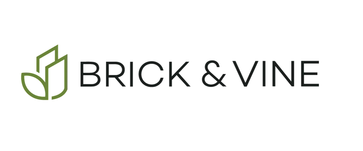 Sleek Brick & Vine logo featuring modern typography and a minimalist leaf design.
