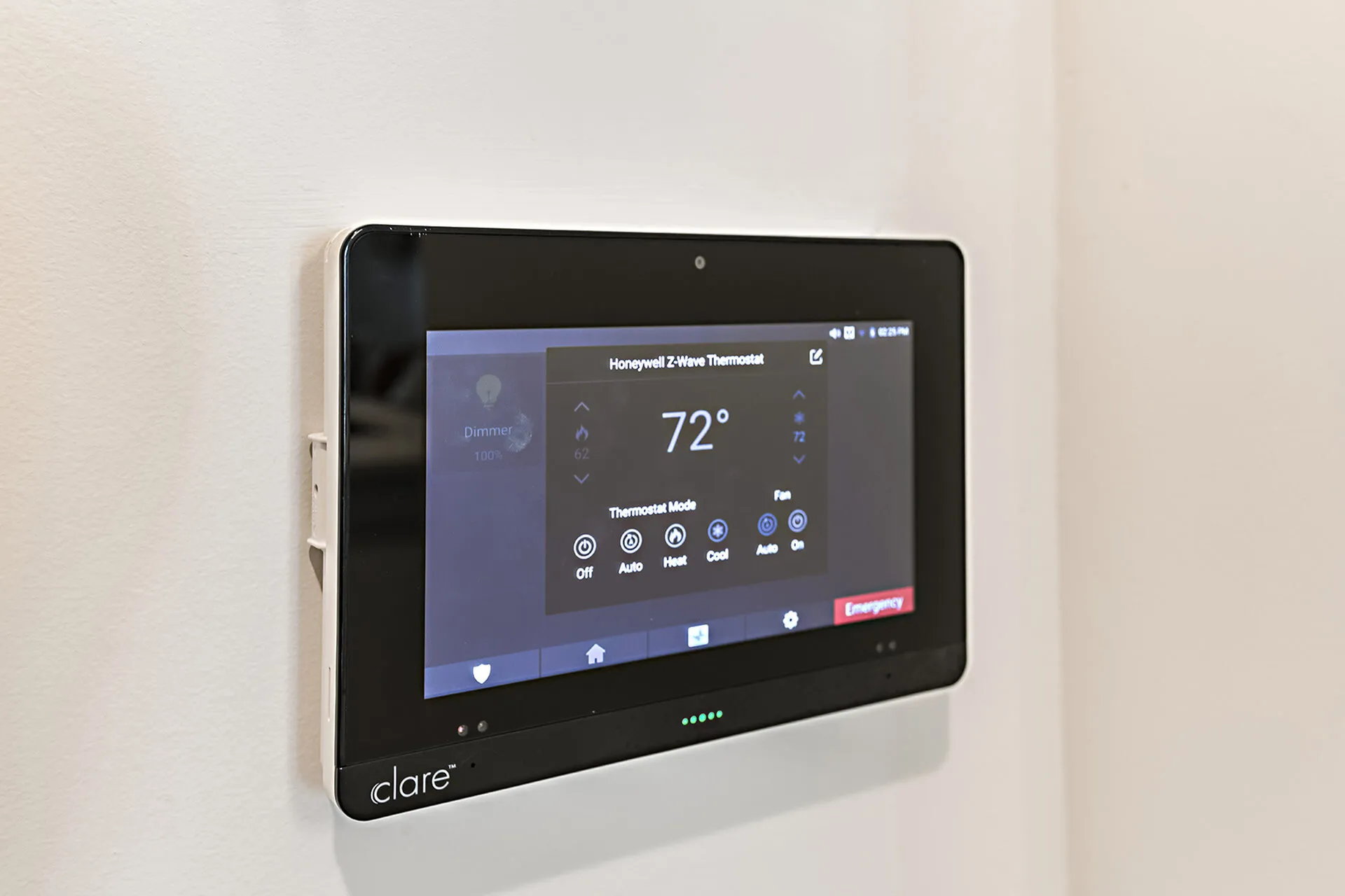 Sleek wall-mounted smart thermostat with digital display, enhancing modern home comfort.