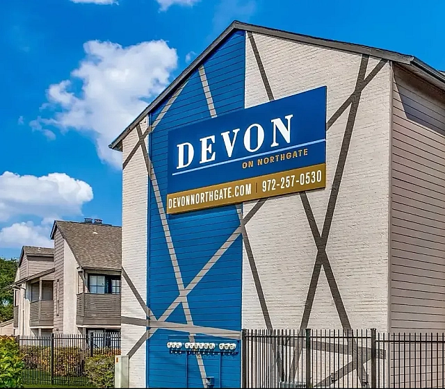 Devon on Northgate apartment exterior wall with large sign