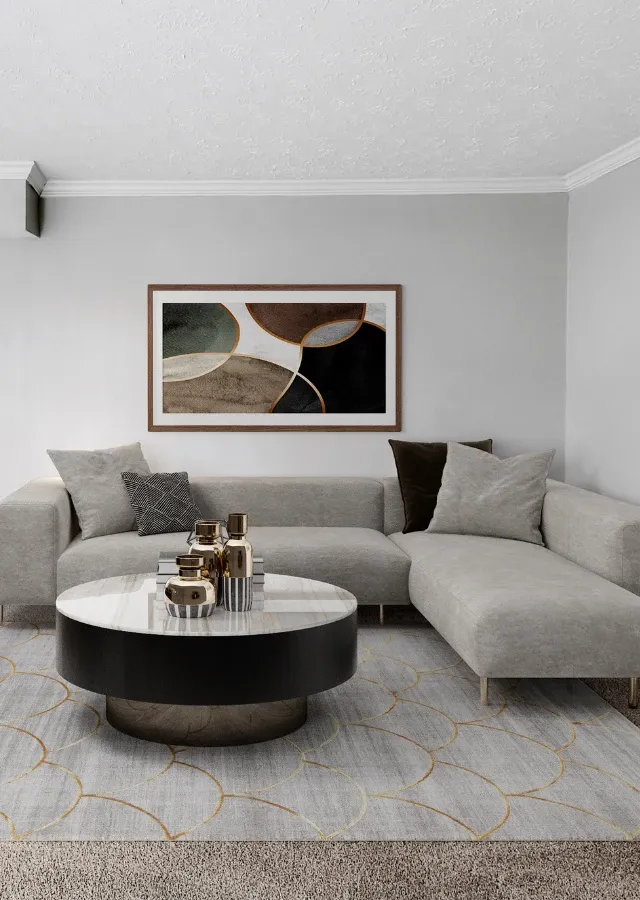 Modern living room with a contemporary sectional sofa, abstract wall art, and a round marble-style coffee table with metallic d&eacute;cor accents. The space features soft neutral tones, plush carpeting, and an elegant patterned area rug cr