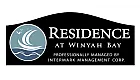 Logo of Residence at Winyah Bay with a stylized sailboat and waves.