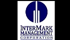 InterMark Management Corporation logo featuring a sleek, modern design with vertical lines and a circular motif.