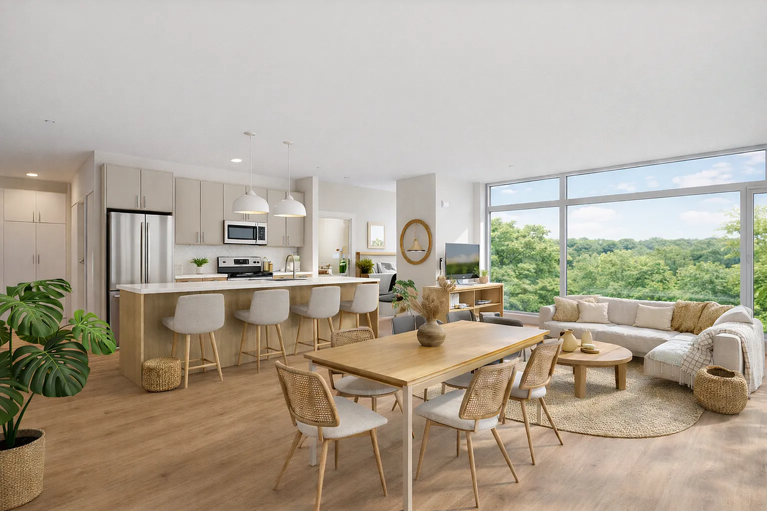 Bright and modern open-concept living area with large windows, featuring a sleek kitchen, cozy dining space, and comfortable seating overlooking lush greenery.