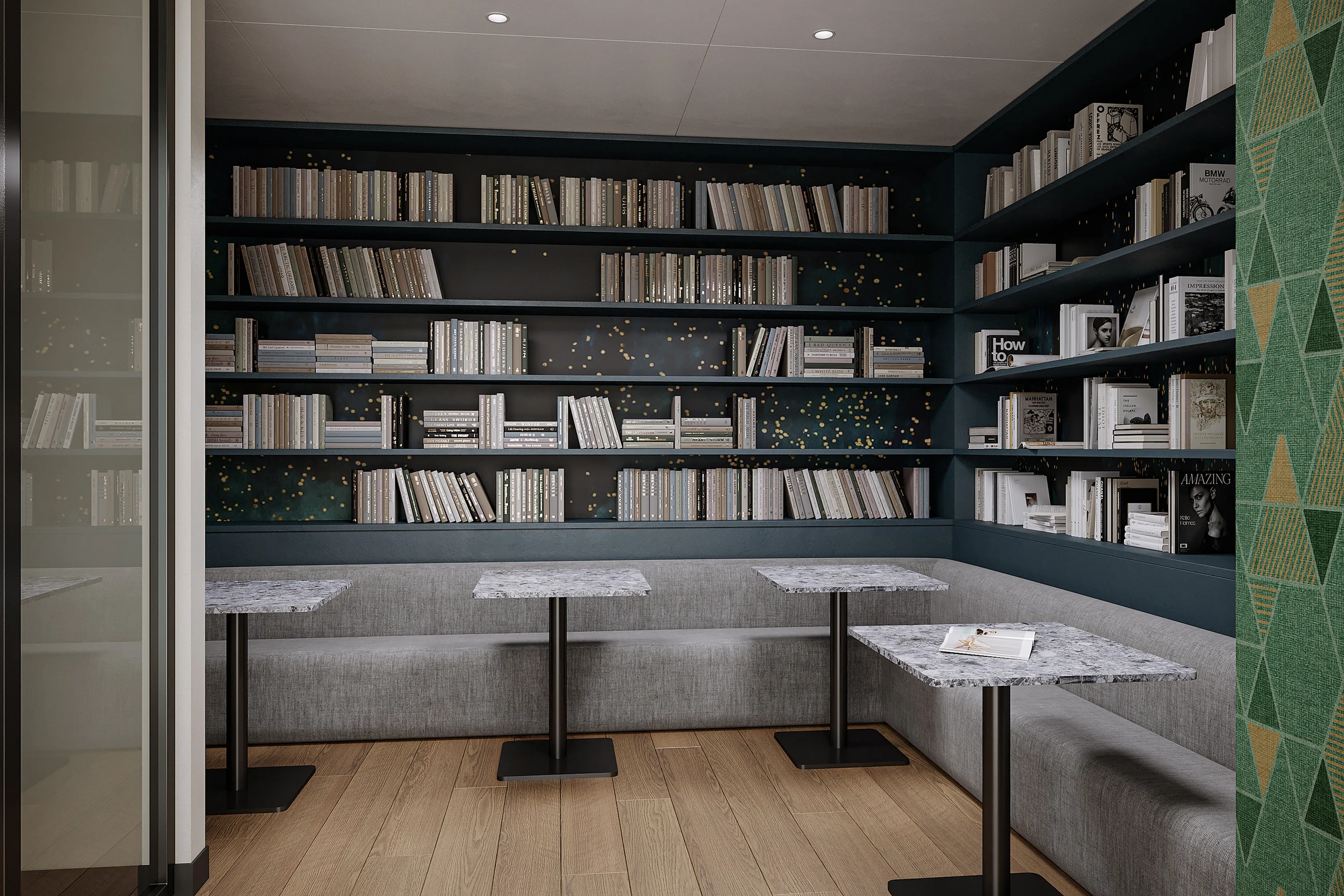 Chic apartment lounge with elegant bookshelves, comfortable seating, and stylish marble tables creating a cozy reading nook.