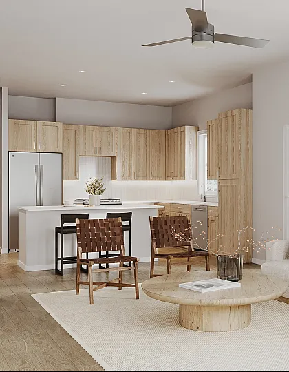 Modern open-concept kitchen and living room with a cozy light-toned sofa, wooden cabinets, and large windows for ample natural light.