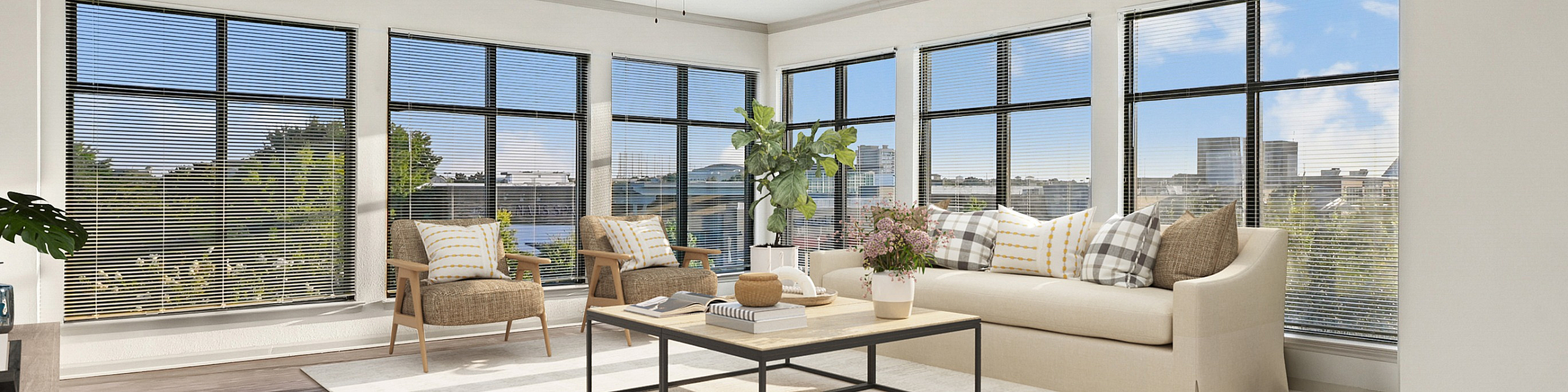 Bright and spacious living room with expansive windows offering stunning cityscape views, elegant hardwood floors, and stylish furnishings.