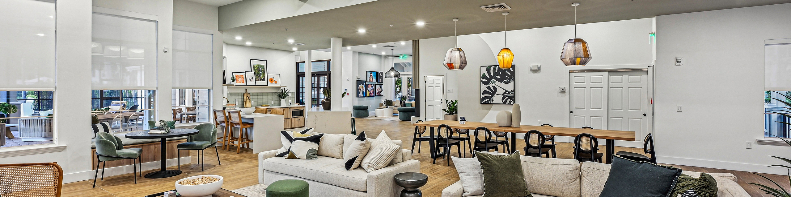Elegant open-concept living space with cozy seating, stylish decor, and modern dining area, ideal for relaxation and entertaining.