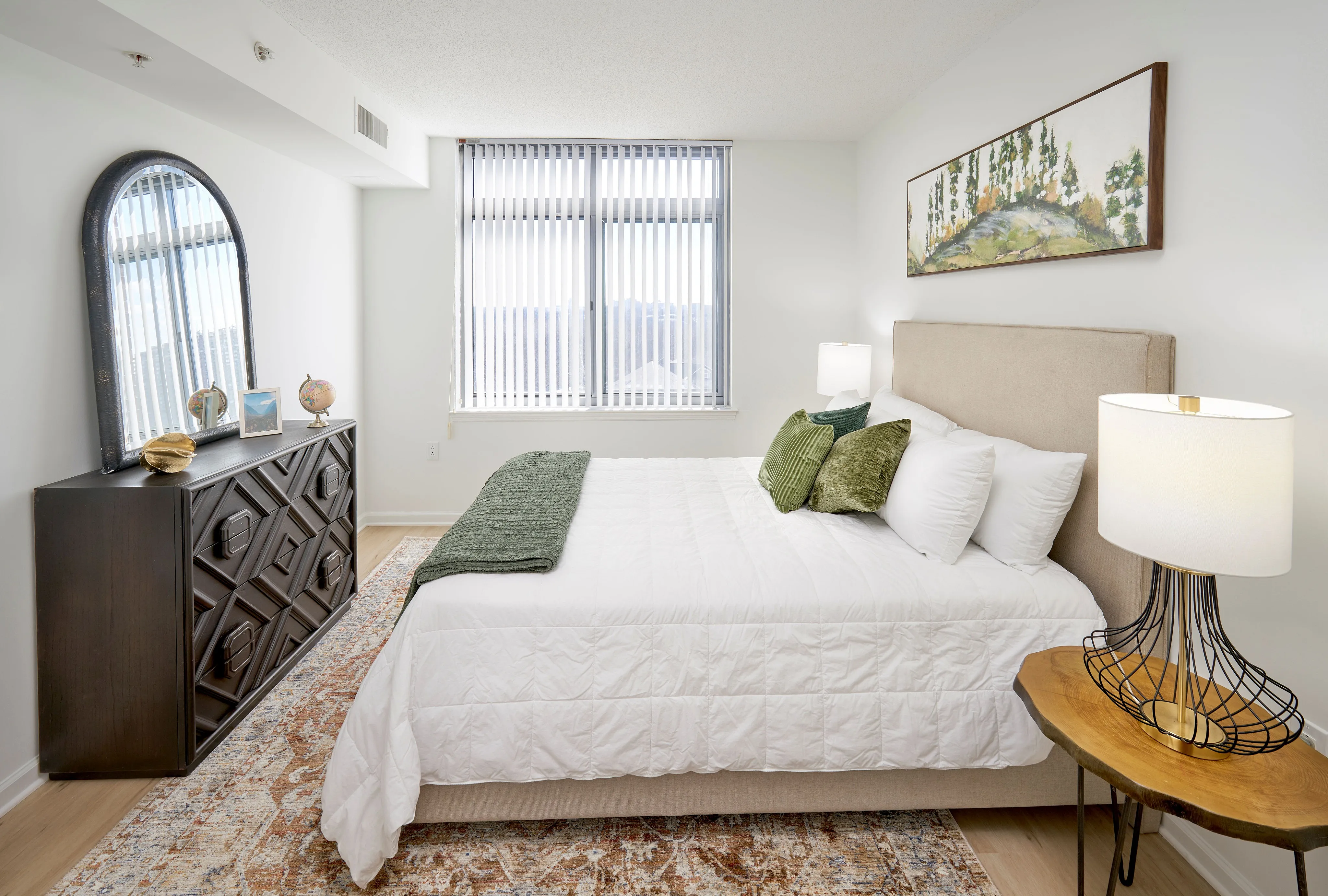Ellington One Bedroom floor plan bedroom with new wood-style flooring and updated light fixtures | Meridian at Grosvenor Station | Luxury North Bethesda MD Apartments | Luxury Rockville MD Apartments