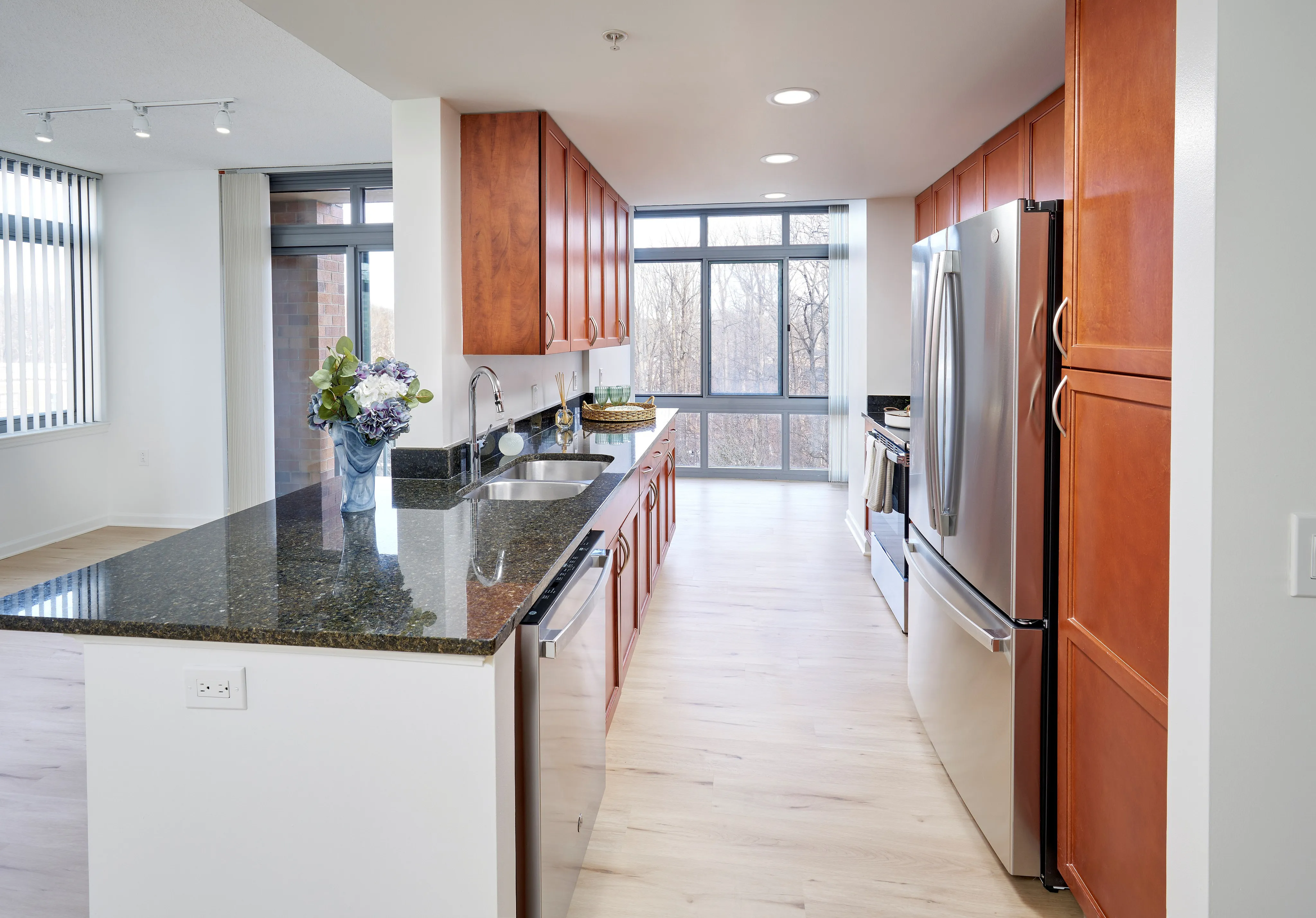 Renovated Copland Two Bedroom eat-in kitchen with stainless steel appliances, granite countertops, and updated fixtures | Meridian at Grosvenor Station | Luxury North Bethesda MD Apartments | Luxury Rockville MD Apartments