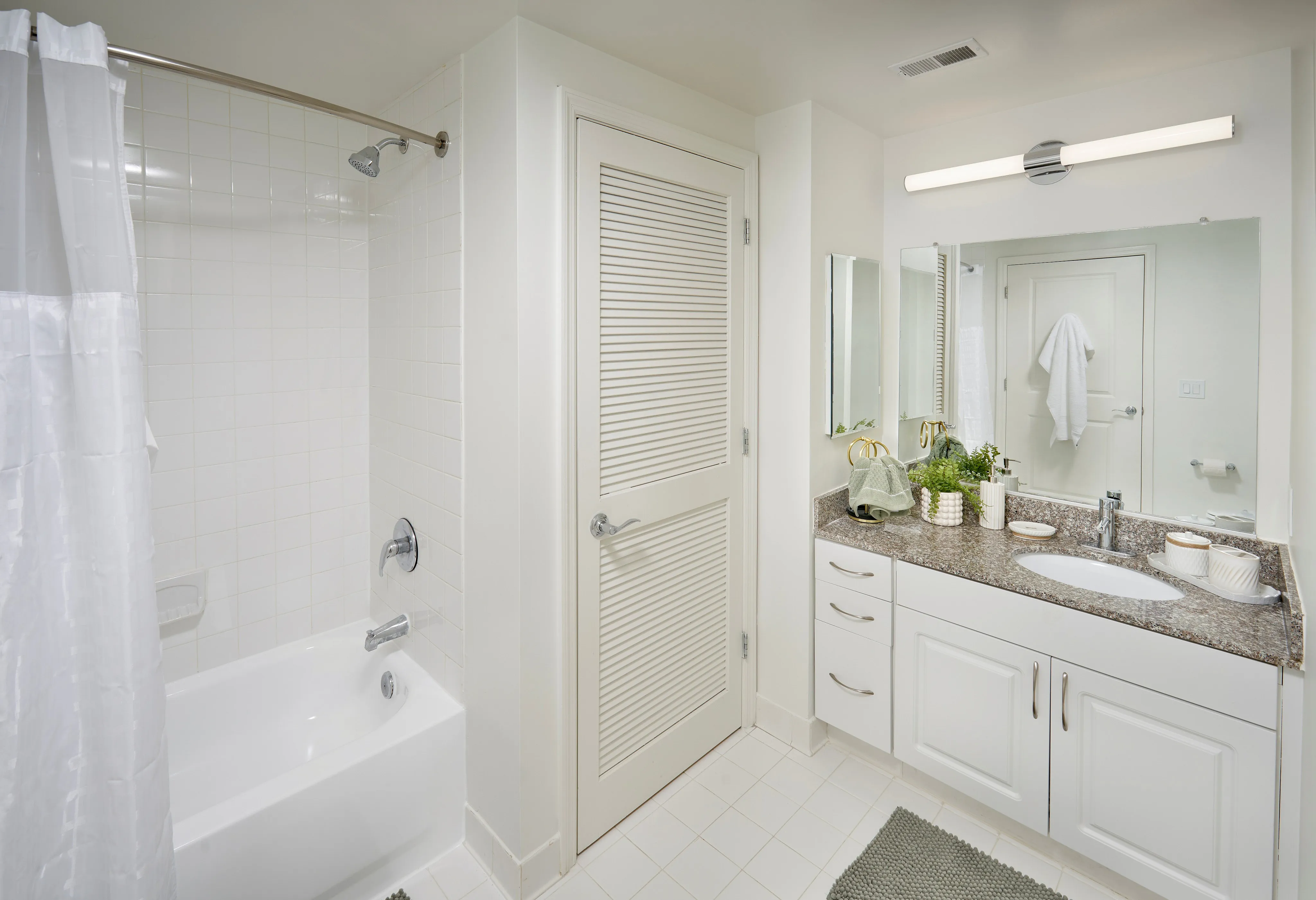 Newly renovated bathroom in Newport 1BR at Meridian at Eisenhower with updated fixtures and custom cabinetry. | Meridian at Eisenhower Station | Luxury Alexandria VA Apartments