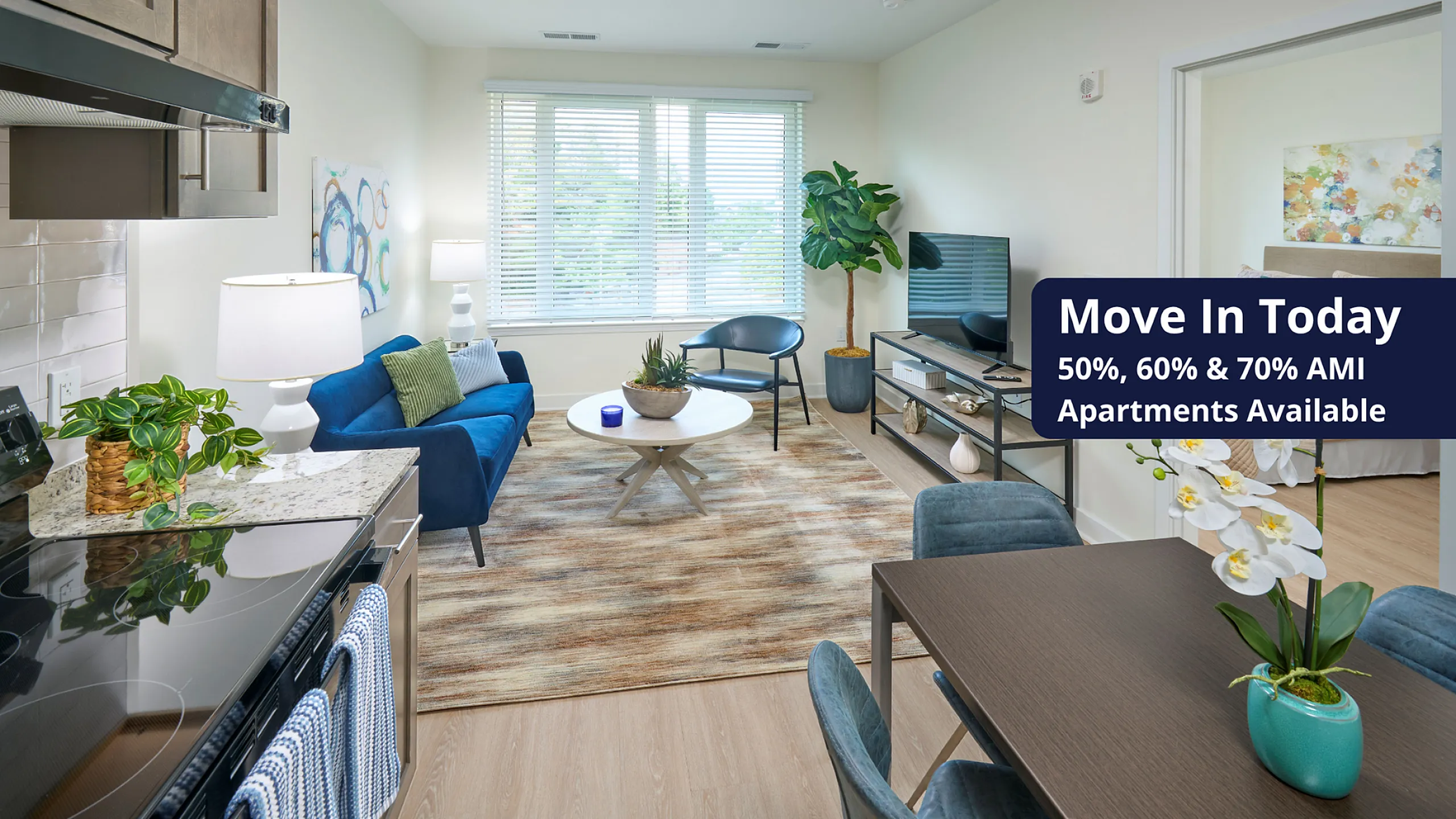 Photo of a Kitchen and Living Room With a Banner Saying Move In Today 50% 60% 70% AMI Apartments Available | Indigo at McLean Station | Affordable Tysons Corner Apartments | Affordable Fairfax Apartments | Affordable McLean Aparments