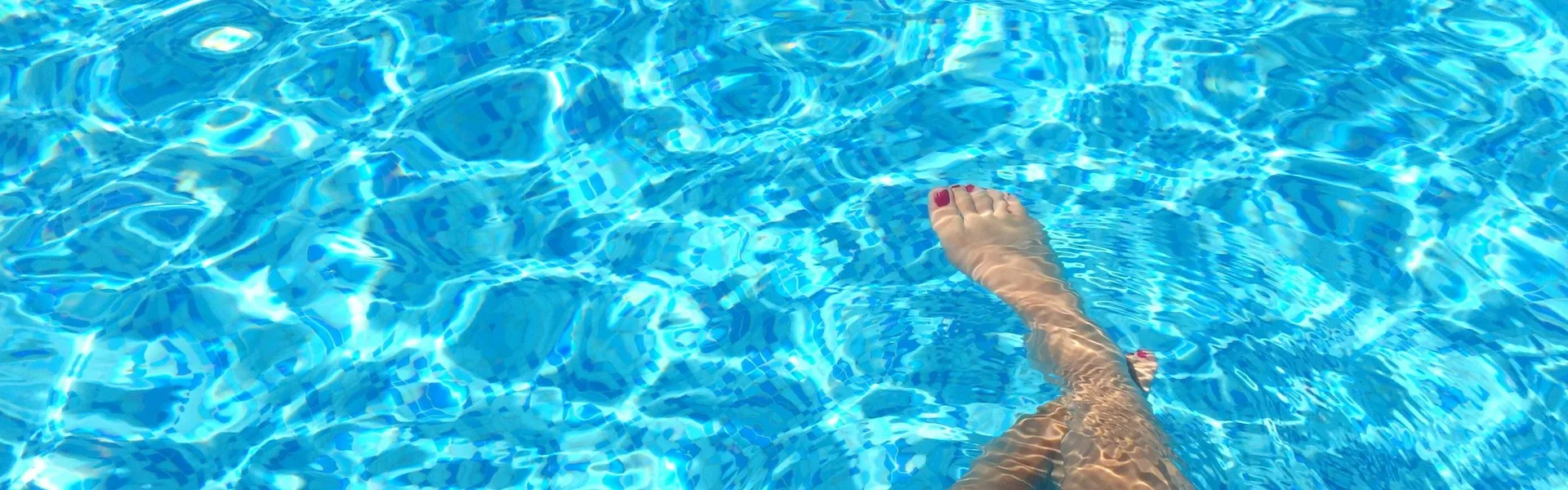 toes in pool water