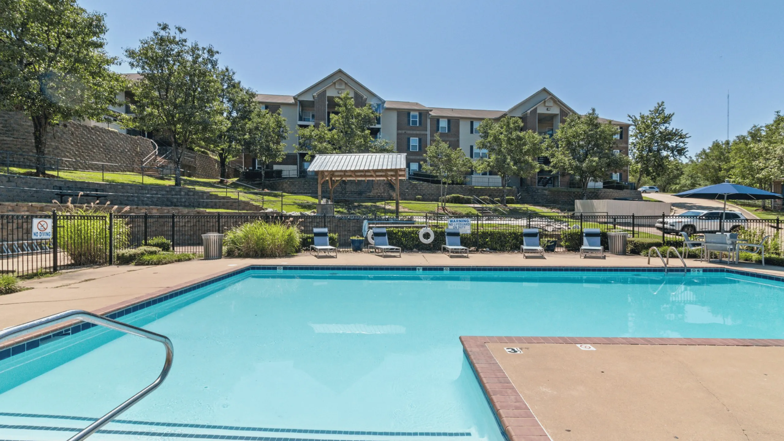 pool with buildings in background